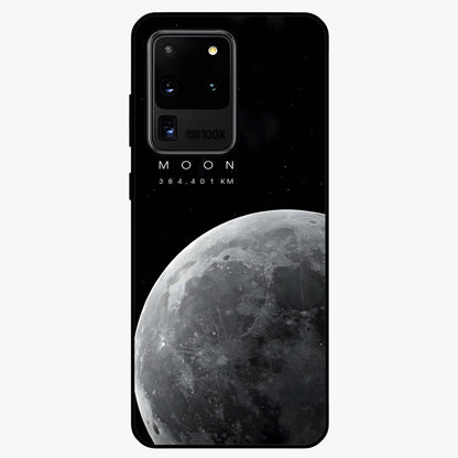 Cosmic Moon Glow Glass Case showing flat back view with glowing moon artwork and glossy glass finish.