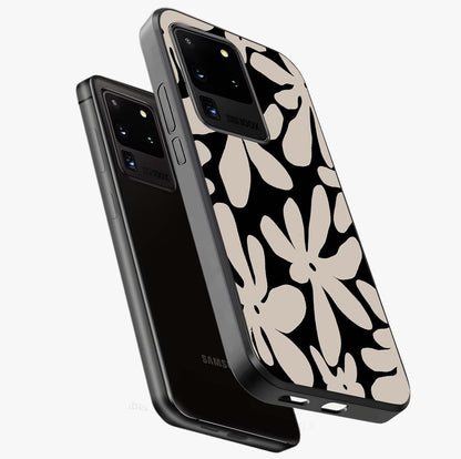 Monochrome Petal Dance Glass Case displayed in angled mockup highlighting elegant petal design with black and white aesthetic.