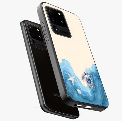 Ocean Drift Turtle Glass Case displayed in angled mockup highlighting peaceful ocean turtle illustration with marine aesthetic.