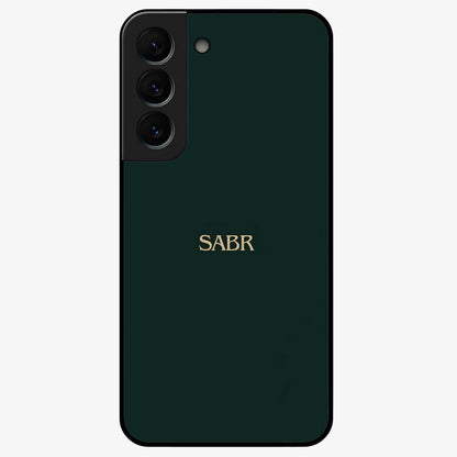 Sabr Minimal Patience Glass Case showing flat back view with minimalist typography artwork and glossy glass finish.