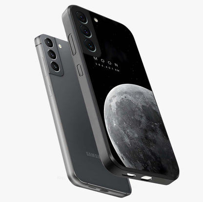 Cosmic Moon Glow Glass Case displayed in angled mockup highlighting celestial moon design with cosmic aesthetic theme.