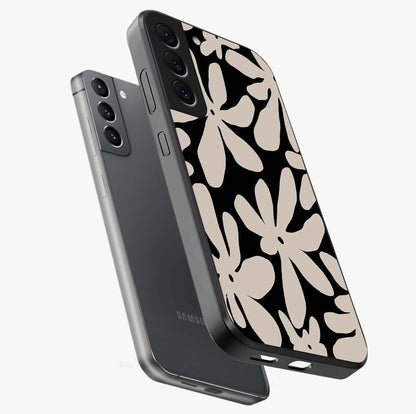 Monochrome Petal Dance Glass Case displayed in angled mockup highlighting elegant petal design with black and white aesthetic.