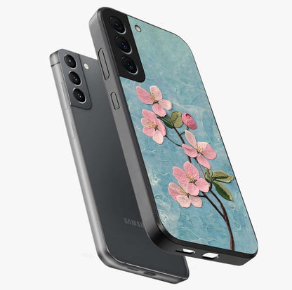 Threaded Blossom Breeze Glass Case displayed in angled mockup highlighting elegant floral design with soft aesthetic style.