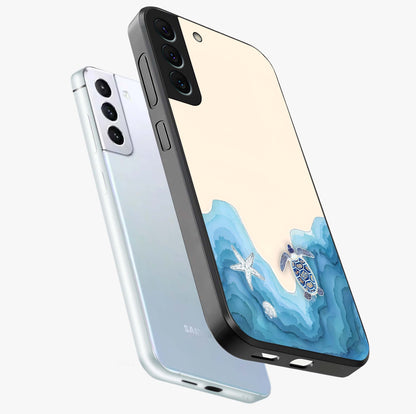 Ocean Drift Turtle Glass Case displayed in angled mockup highlighting peaceful ocean turtle illustration with marine aesthetic.