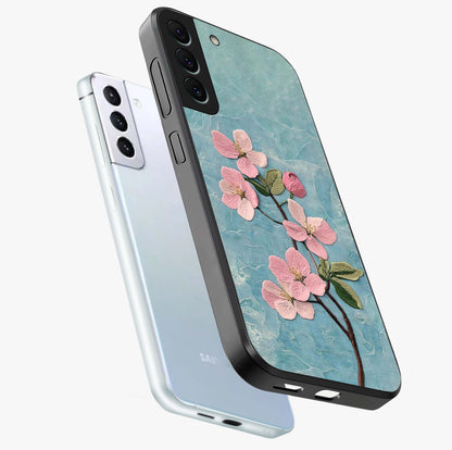 Threaded Blossom Breeze Glass Case displayed in angled mockup highlighting elegant floral design with soft aesthetic style.