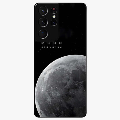 Cosmic Moon Glow Glass Case showing flat back view with glowing moon artwork and glossy glass finish.