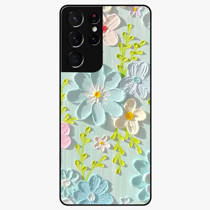 Frosted Petal Garden Glass Case showing flat back view with soft frosted floral artwork and glossy glass finish.