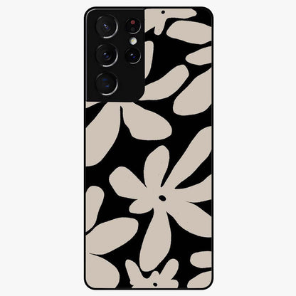 Monochrome Petal Dance Glass Case showing flat back view with monochrome floral artwork and glossy glass finish.