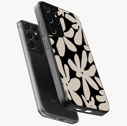 Monochrome Petal Dance Glass Case displayed in angled mockup highlighting elegant petal design with black and white aesthetic.