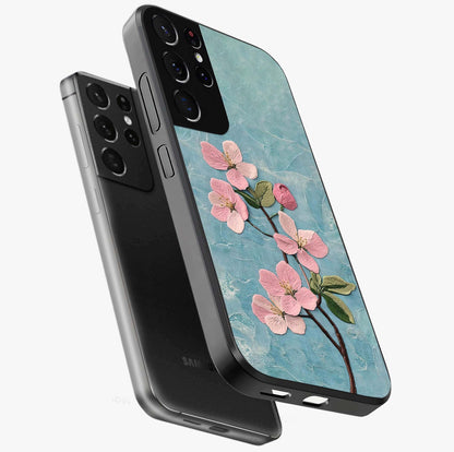 Threaded Blossom Breeze Glass Case displayed in angled mockup highlighting elegant floral design with soft aesthetic style.