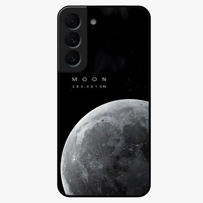 Cosmic Moon Glow Glass Case showing flat back view with glowing moon artwork and glossy glass finish.