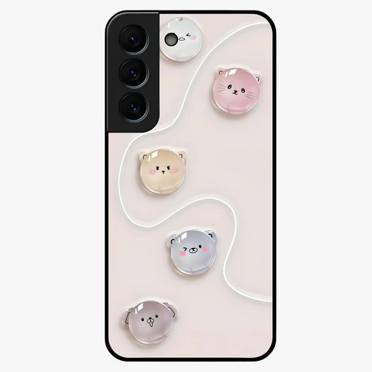 Puffy Face Parade Glass Case showing flat back view with cute puffy character faces artwork and glossy glass finish.
