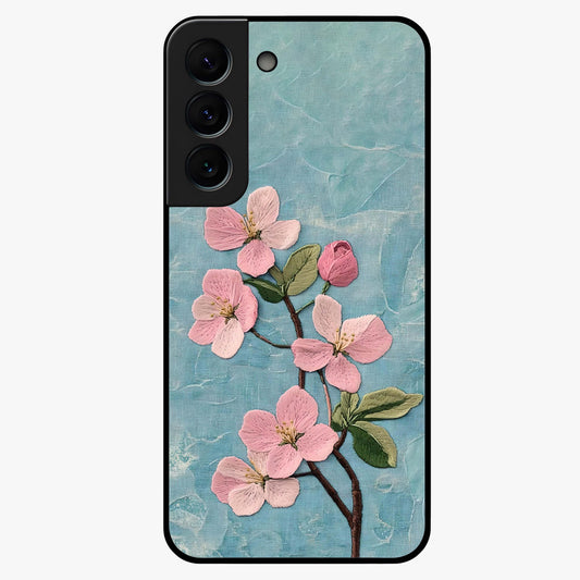 Threaded Blossom Breeze Glass Case showing flat back view with delicate blossom artwork and glossy glass finish.