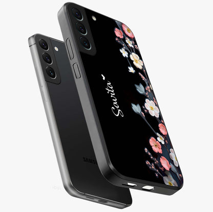 Black Elegance Floral Custom Name Glass Case displayed in angled mockup highlighting dark floral aesthetic and custom name feature.