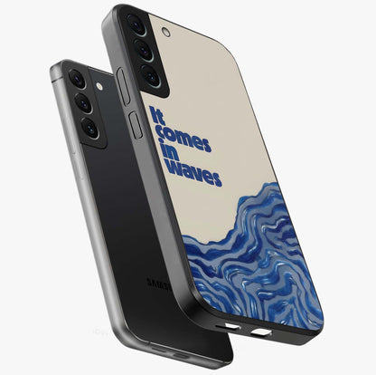 It Comes In Waves Quote Glass Case displayed in angled mockup highlighting ocean wave typography design with aesthetic style.