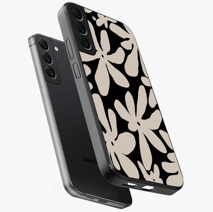 Monochrome Petal Dance Glass Case displayed in angled mockup highlighting elegant petal design with black and white aesthetic.