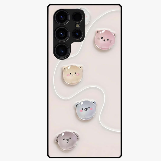 Puffy Face Parade Glass Case showing flat back view with cute puffy character faces artwork and glossy glass finish.