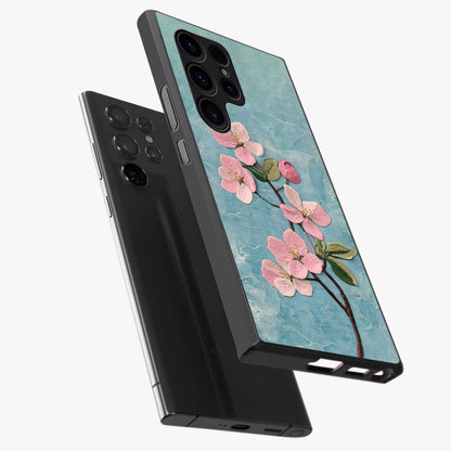 Threaded Blossom Breeze Glass Case displayed in angled mockup highlighting elegant floral design with soft aesthetic style.