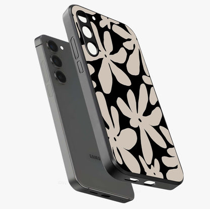 Monochrome Petal Dance Glass Case displayed in angled mockup highlighting elegant petal design with black and white aesthetic.