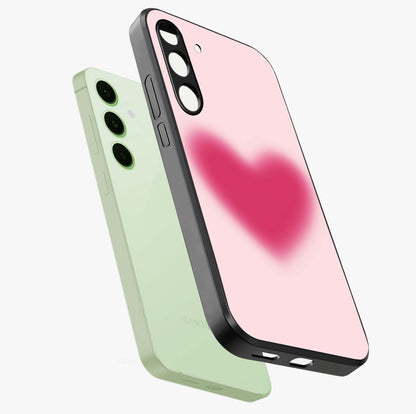 Pink Aura Heart Glass Case displayed in angled mockup highlighting vibrant pink heart design with dreamy aura aesthetic.