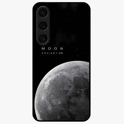 Cosmic Moon Glow Glass Case showing flat back view with glowing moon artwork and glossy glass finish.