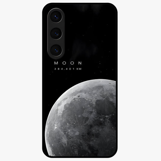 Cosmic Moon Glow Glass Case showing flat back view with glowing moon artwork and glossy glass finish.