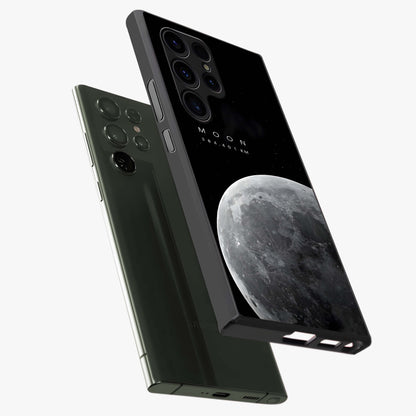 Cosmic Moon Glow Glass Case displayed in angled mockup highlighting celestial moon design with cosmic aesthetic theme.
