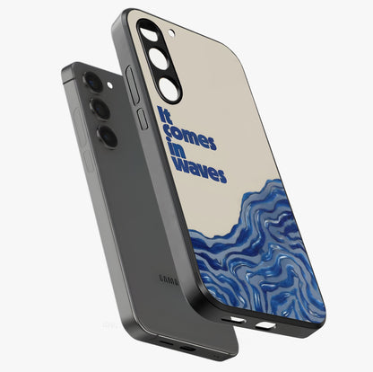 It Comes In Waves Quote Glass Case displayed in angled mockup highlighting ocean wave typography design with aesthetic style.