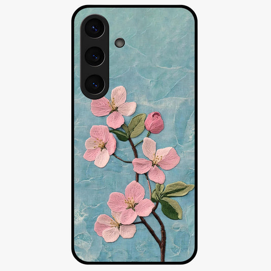 Threaded Blossom Breeze Glass Case showing flat back view with delicate blossom artwork and glossy glass finish.