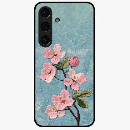 Threaded Blossom Breeze Glass Case showing flat back view with delicate blossom artwork and glossy glass finish.