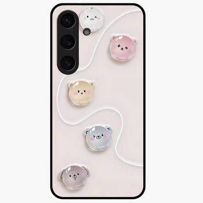 Puffy Face Parade Glass Case showing flat back view with cute puffy character faces artwork and glossy glass finish.