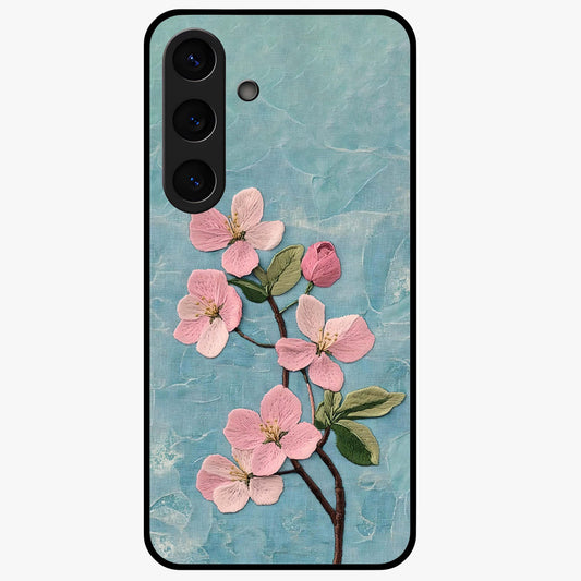 Threaded Blossom Breeze Glass Case showing flat back view with delicate blossom artwork and glossy glass finish.