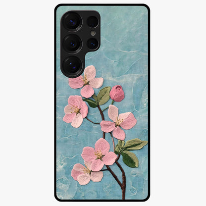 Threaded Blossom Breeze Glass Case showing flat back view with delicate blossom artwork and glossy glass finish.