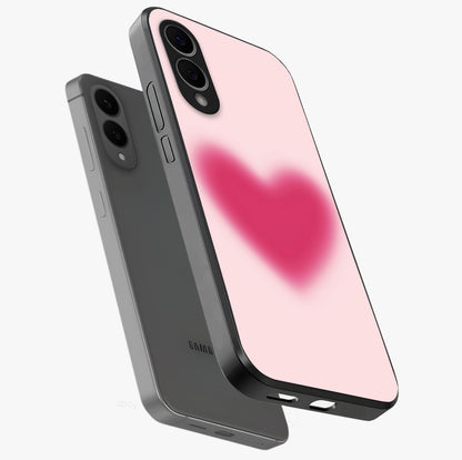 Pink Aura Heart Glass Case displayed in angled mockup highlighting vibrant pink heart design with dreamy aura aesthetic.