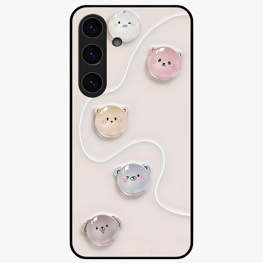 Puffy Face Parade Glass Case showing flat back view with cute puffy character faces artwork and glossy glass finish.