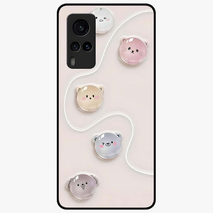 Puffy Face Parade Glass Case showing flat back view with cute puffy character faces artwork and glossy glass finish.