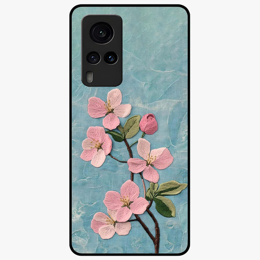 Threaded Blossom Breeze Glass Case showing flat back view with delicate blossom artwork and glossy glass finish.