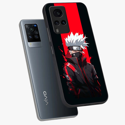 Kakashi Scarlet Shadow Glass Case displayed in angled mockup highlighting dramatic ninja illustration with scarlet themed aesthetic.