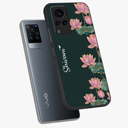 Lotus Bloom Serenity Custom Name Glass Case displayed in angled mockup highlighting graceful lotus illustration with custom name feature.