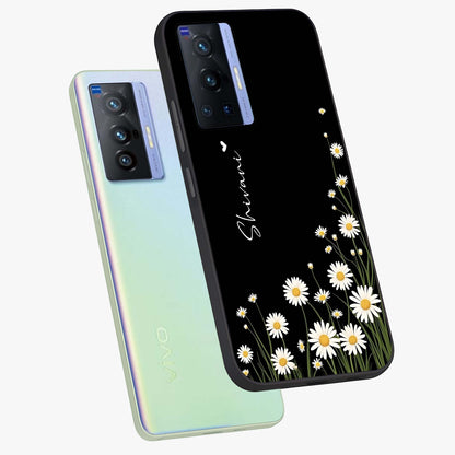 Daisy Cascade Custom Name Glass Case displayed in angled mockup highlighting delicate daisy artwork with custom name feature.