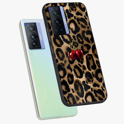 Leopard Wild Cherry Glass Case displayed in angled mockup highlighting bold animal print design with playful cherry aesthetic.
