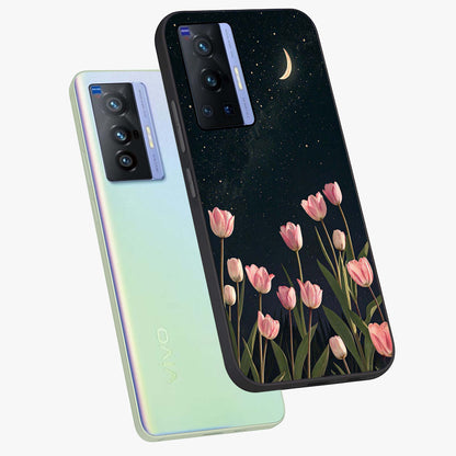 Midnight Tulip Whispers Vibe Glass Case displayed in angled mockup highlighting delicate tulip design with midnight floral aesthetic.