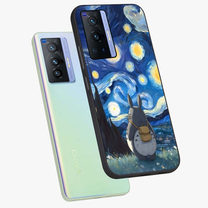 Totoro In Van Gogh Art Glass Case displayed in angled mockup highlighting artistic swirling sky design with playful animation aesthetic.