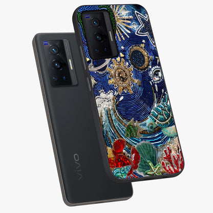 Universe Underwater Spark Glass Case displayed in angled mockup highlighting glowing aquatic design with celestial aesthetic.