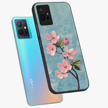 Threaded Blossom Breeze Glass Case displayed in angled mockup highlighting elegant floral design with soft aesthetic style.