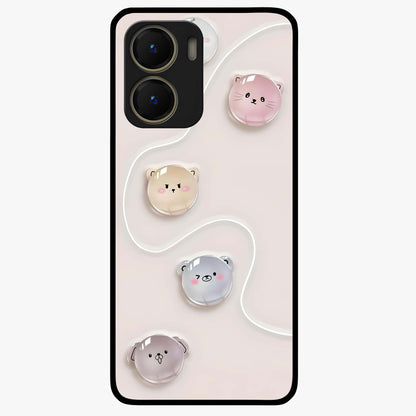 Puffy Face Parade Glass Case showing flat back view with cute puffy character faces artwork and glossy glass finish.