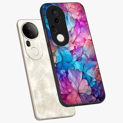 Radiant Floral Whirl Glass Case displayed in angled mockup highlighting vibrant flower pattern with dynamic artistic aesthetic.