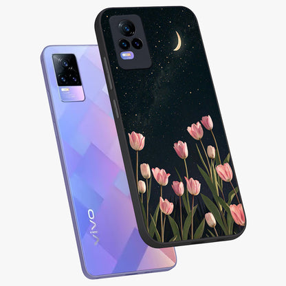 Midnight Tulip Whispers Vibe Glass Case displayed in angled mockup highlighting delicate tulip design with midnight floral aesthetic.