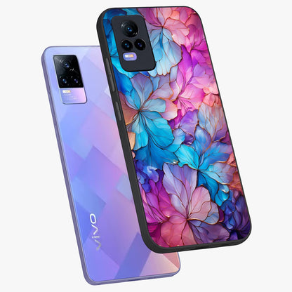 Radiant Floral Whirl Glass Case displayed in angled mockup highlighting vibrant flower pattern with dynamic artistic aesthetic.