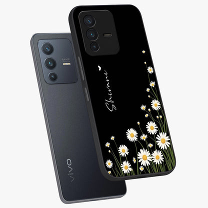 Daisy Cascade Custom Name Glass Case displayed in angled mockup highlighting delicate daisy artwork with custom name feature.